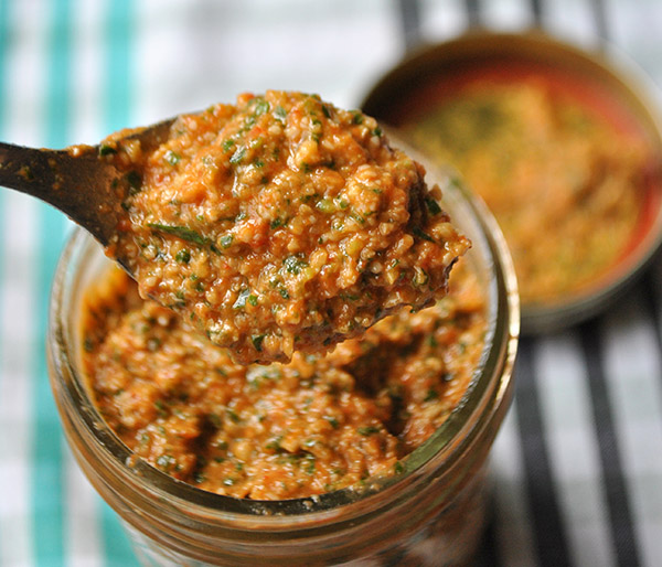 roasted red pepper pesto in a jar with spoon